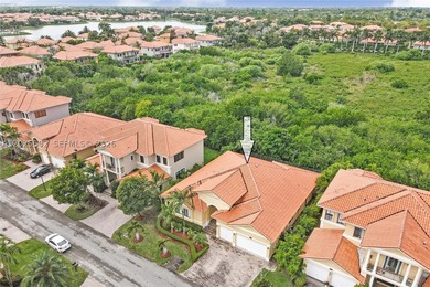 ONE-STORY HOME WITH A 3-CAR GARAGE IN THE EXCLUSIVE CUTLER CAY - photo 3