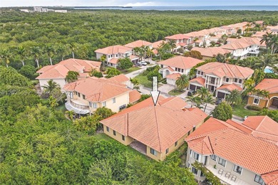 ONE-STORY HOME WITH A 3-CAR GARAGE IN THE EXCLUSIVE CUTLER CAY - photo 4