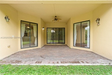 ONE-STORY HOME WITH A 3-CAR GARAGE IN THE EXCLUSIVE CUTLER CAY - photo 6