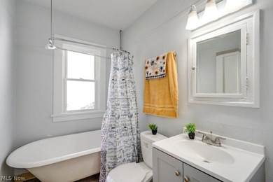 This maintained triplex is conveniently located just minutes - photo 5