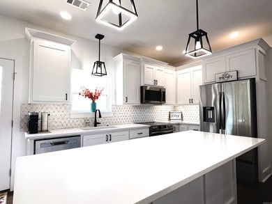 Step inside this beautifully upgraded home featuring hardwood - photo 10