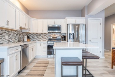 Experience elevated lakefront living in this stylish townhouse - photo 2