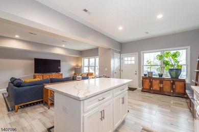 Experience elevated lakefront living in this stylish townhouse - photo 4