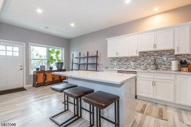 Experience elevated lakefront living in this stylish townhouse - photo 5