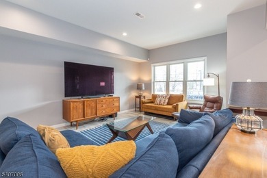 Experience elevated lakefront living in this stylish townhouse - photo 6