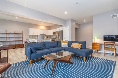 Experience elevated lakefront living in this stylish townhouse - photo 8