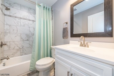 Experience elevated lakefront living in this stylish townhouse - photo 10