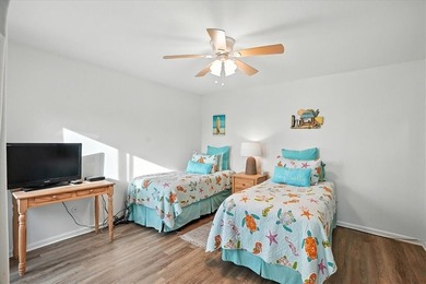 Experience island living at its finest in this beautifully