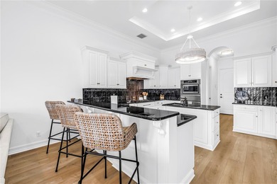 Welcome to one of Tampa Bay's most coveted gated waterfront