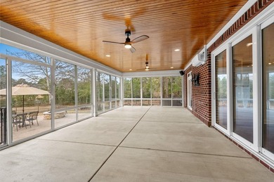 Stacking glass doors, a heated and cooled sunroom, and three - photo 20
