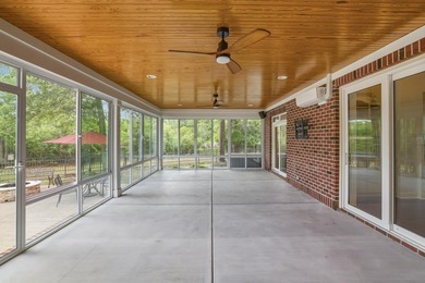 Stacking glass doors, a heated and cooled sunroom, and three - photo 21