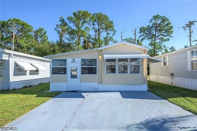 Here's another darling bungalow in the LAND OWNED community of - photo 1