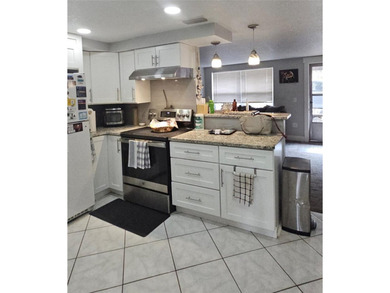 PRICE REDUCTION! On this Rare Lake Front Home with your own - photo 11