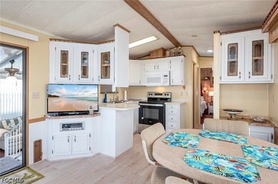 Here's another darling bungalow in the LAND OWNED community of - photo 7