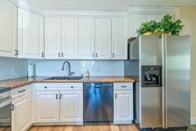 Welcome to this beautifully maintained two-story condominium in - photo 14