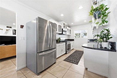 Welcome home to one of the most stylishly designed homes on the - photo 6