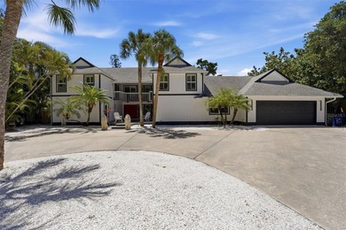 Hidden behind an expansive 250-foot circular driveway, the - photo 1