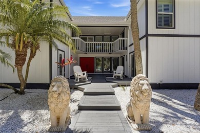 Hidden behind an expansive 250-foot circular driveway, the - photo 3