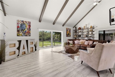 Hidden behind an expansive 250-foot circular driveway, the - photo 6