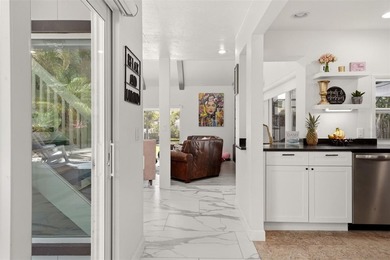 Hidden behind an expansive 250-foot circular driveway, the - photo 8