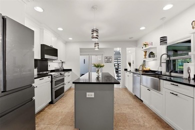 Hidden behind an expansive 250-foot circular driveway, the - photo 9