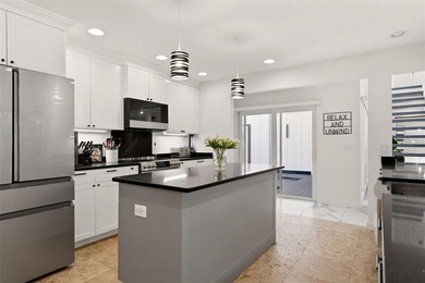 Hidden behind an expansive 250-foot circular driveway, the - photo 10
