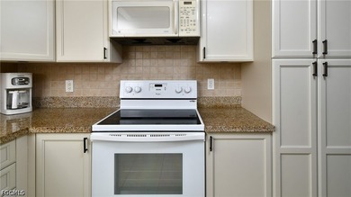 Second floor condo with beautiful golf and water views!! BEST - photo 8