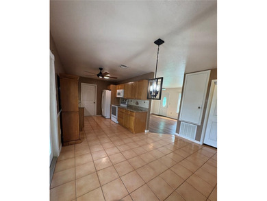 Opportunity awaits with this 3-bedroom, 2-bath home offering a - photo 8