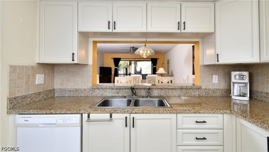Second floor condo with beautiful golf and water views!! BEST - photo 9