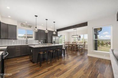 This stunning 4-bed, 3-bath mountain retreat combines luxury - photo 9