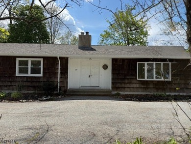 Welcome to this spacious four-bedroom ranch nestled in the - photo 1