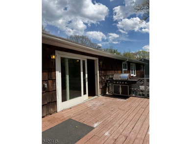 Welcome to this spacious four-bedroom ranch nestled in the - photo 4