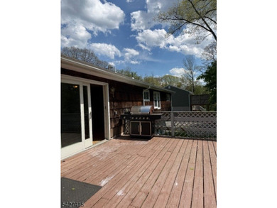 Welcome to this spacious four-bedroom ranch nestled in the - photo 5