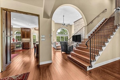 Set on a premier lakefront lot along the shores of Table Rock - photo 16