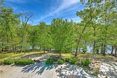 Set on a premier lakefront lot along the shores of Table Rock - photo 17
