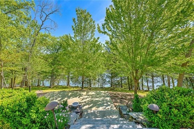 Set on a premier lakefront lot along the shores of Table Rock - photo 19