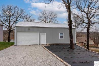 This expansive home in Warsaw, MO. Near Truman Lake and Lake of - photo 41