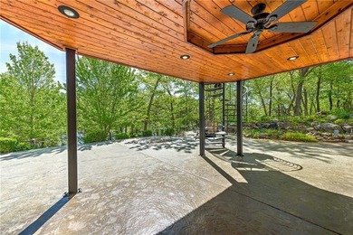 Set on a premier lakefront lot along the shores of Table Rock - photo 42
