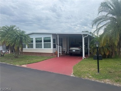 Welcome to this furnished 1980 two-bedroom, two-bath home - photo 1