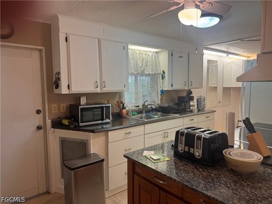 Welcome to this furnished 1980 two-bedroom, two-bath home - photo 9