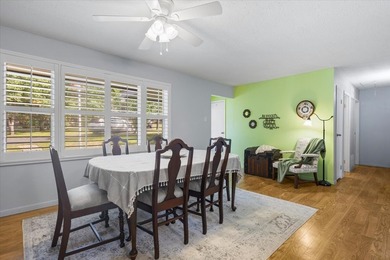 This well-maintained 3-bedroom, 2-bath home is nestled on a - photo 2