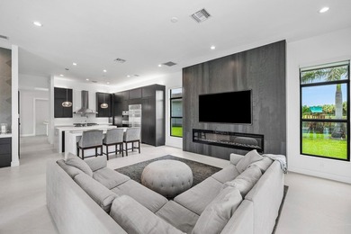 Nestled behind the prestigious gates of Boca Bridges, this - photo 19