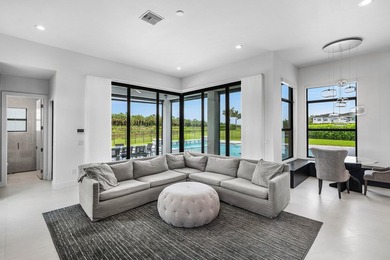 Nestled behind the prestigious gates of Boca Bridges, this - photo 20