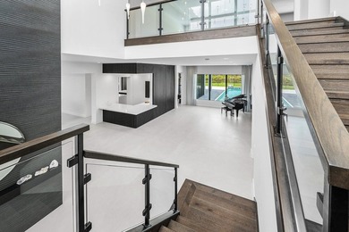 Nestled behind the prestigious gates of Boca Bridges, this - photo 23