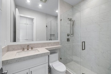 Nestled behind the prestigious gates of Boca Bridges, this - photo 29