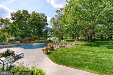 Set along the peaceful waters of Caulk Cove, this extraordinary - photo 29