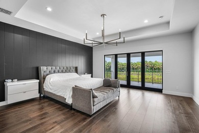 Nestled behind the prestigious gates of Boca Bridges, this - photo 30