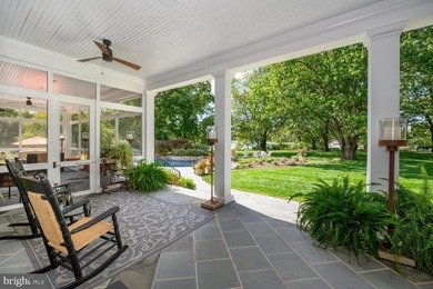 Set along the peaceful waters of Caulk Cove, this extraordinary - photo 32