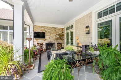 Set along the peaceful waters of Caulk Cove, this extraordinary - photo 33