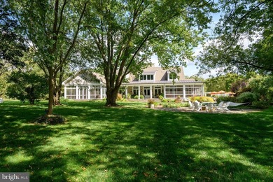 Set along the peaceful waters of Caulk Cove, this extraordinary - photo 34